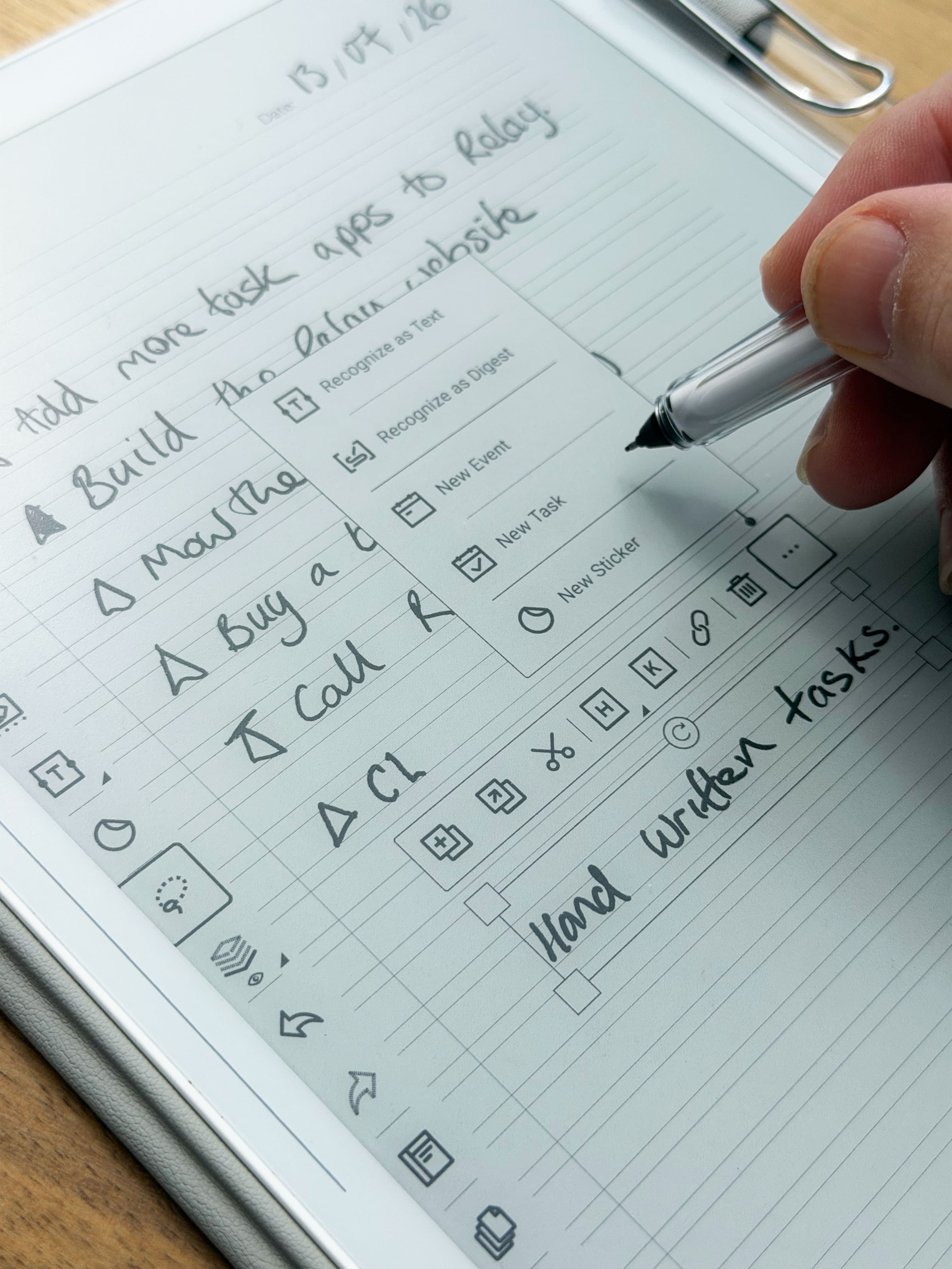 A handwritten task list on a Supernote — including ‘Add more task apps to Relay’ — with the stylus opening the New Task menu